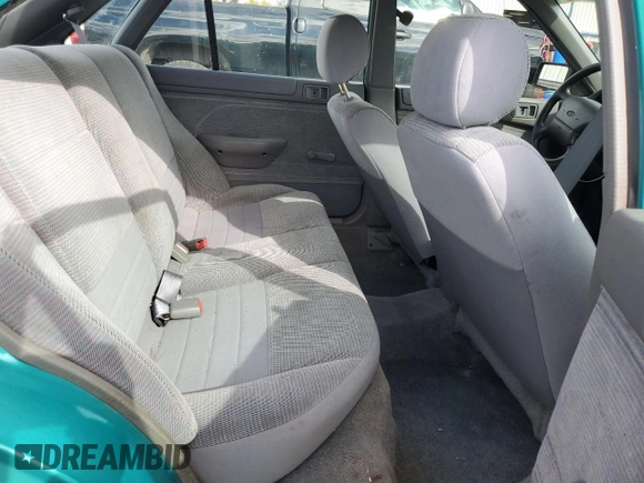 1995 Ford Escort z VIN 1FASP14J9SW128191, wystawiony jako Copart lot #75688724 z przebiegiem 85 423 mil mil oraz Czysty tytuł • Clean title. Historia ofert i sprzedaży dostępna na DreamBid. Obrazek 10.