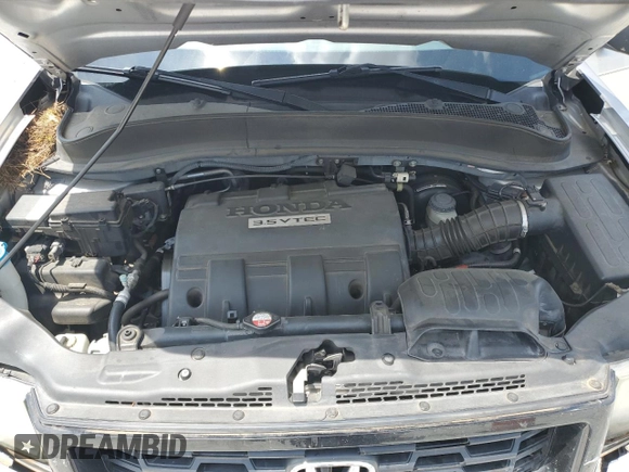 2013 Honda Ridgeline Sport with VIN 5FPYK1F77DB009641, listed as a Copart auction lot 63378875 with 115,828 mi miles and Salvage title. Bid and sale history available at DreamBid. Image 11.