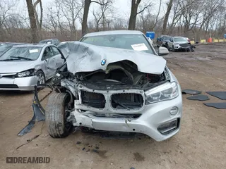 2018 BMW X6 xDrive35i with VIN 5UXKU2C50J0X49445, listed as a IAAI auction lot 41449077 with 130,912 mi miles. Bid and sale history available at carsss.com. Image 11.