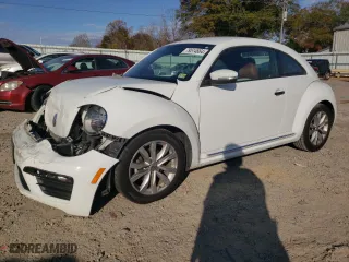 2017 Volkswagen Beetle 1.8T Fleet with VIN 3VWF17AT7HM629947, listed as a Copart auction lot 79514664 with 92,905 mi miles and Salvage Title. Bid and sale history available at carsss.com. Image 1.