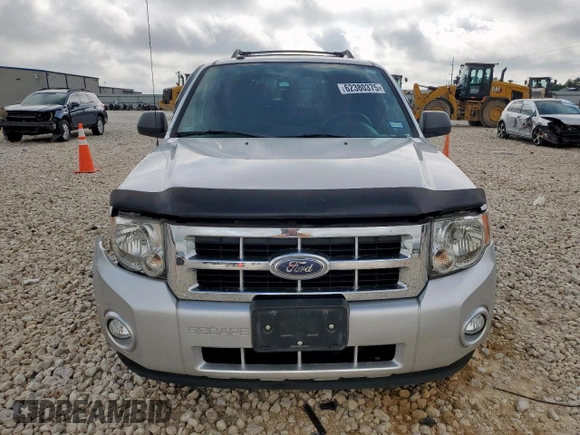 2012 Ford Escape XLT z VIN 1FMCU9DG5CKA92739, wystawiony jako Copart lot #62380375 z przebiegiem 68 755 mil mil oraz Szkoda całkowita • Salvage title. Historia ofert i sprzedaży dostępna na DreamBid. Obrazek 5.