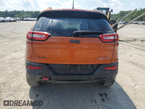 2014 Jeep Cherokee Trailhawk z VIN 1C4PJMBS4EW236608, wystawiony jako Copart lot #63672685 z przebiegiem 132 341 mil mil oraz Szkoda całkowita • Salvage title. Historia ofert i sprzedaży dostępna na DreamBid. Obrazek 6.