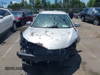 2014 Toyota Corolla L with VIN 2T1BURHE6EC201402, listed as a IAAI auction lot 42350827 with 100,704 mi miles and . Bid and sale history available at DreamBid. Image 12.