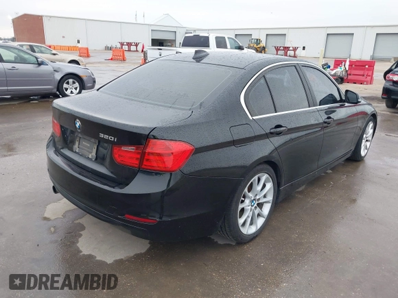2015 BMW 3 Series 320i with VIN WBA3B1G5XFNT02032, listed as a IAAI auction lot 41581535 with 170,114 mi miles. Bid and sale history available at carsss.com. Image 4.