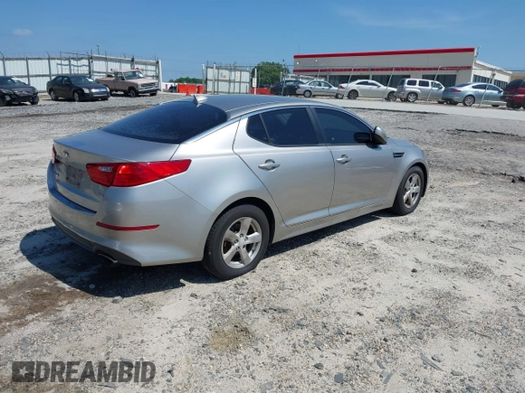 2014 Kia Optima LX with VIN KNAGM4A79E5470198, listed as a IAAI auction lot 42142484 with 169,140 mi miles. Bid and sale history available at carsss.com. Image 4.