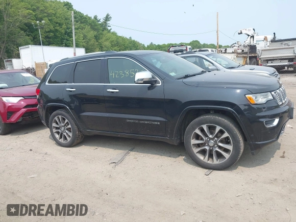 2017 Jeep Grand Cherokee Overland z VIN 1C4RJFCG4HC632929, wystawiony jako IAAI lot #42385321 z przebiegiem 205 593 mil mil oraz . Historia ofert i sprzedaży dostępna na DreamBid. Obrazek 13.