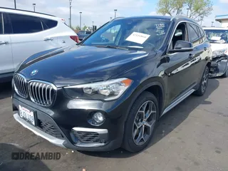 2019 BMW X1 sDrive28i with VIN WBXHU7C59K5L12320, listed as a IAAI auction lot 42116860 with 28,183 mi miles and . Bid and sale history available at DreamBid. Image 18.