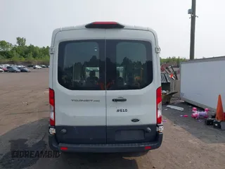 2018 Ford Transit z VIN 1FTYR2CM5JKA24044, wystawiony jako IAAI lot #42422667 z przebiegiem 279 853 mil mil oraz . Historia ofert i sprzedaży dostępna na DreamBid. Obrazek 16.