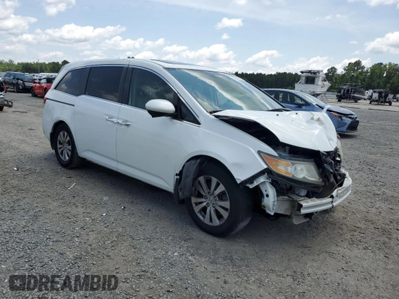 2014 Honda Odyssey EX-L with VIN 5FNRL5H67EB051217, listed as a Copart auction lot 59954225 with 262,816 mi miles and Salvage title. Bid and sale history available at DreamBid. Image 4.