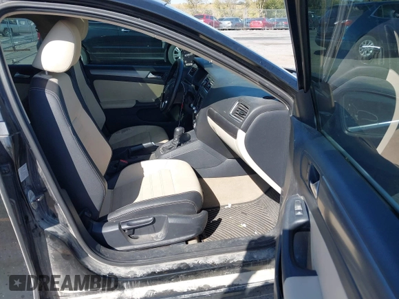 2012 Volkswagen Jetta Sedan SEL w/Sunroof with VIN 3VWLX7AJ2CM388825, listed as a IAAI auction lot 40490216 with 144,694 mi miles. Bid and sale history available at carsss.com. Image 5.