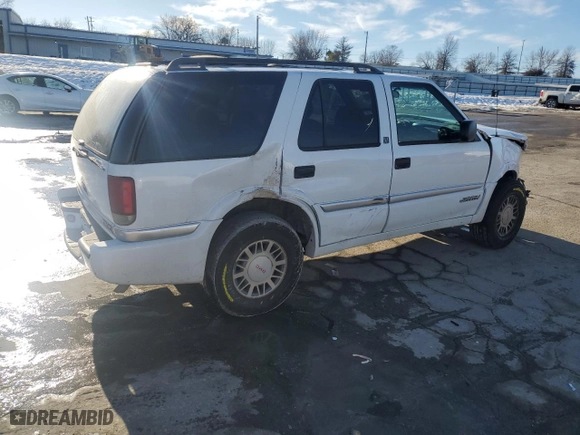 2000 GMC Envoy with VIN 1GKDT13W4Y2348984, listed as a Copart auction lot 89062865 with 159,592 mi miles and Salvage Title. Bid and sale history available at carsss.com. Image 3.