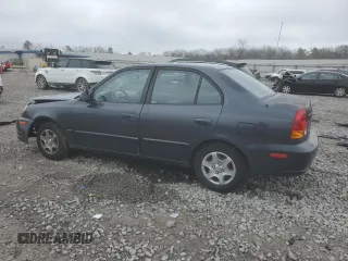2005 Hyundai Accent GLS with VIN KMHCG45C85U671205, listed as a Copart auction lot 44362455 with 93,032 mi miles and Salvage Title. Bid and sale history available at carsss.com. Image 2.
