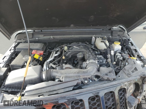 2023 Jeep Gladiator Willys z VIN 1C6HJTAG0PL507803, wystawiony jako Copart lot #48526875 z przebiegiem 51 811 mil mil oraz Czysty tytuł • Clean title. Historia ofert i sprzedaży dostępna na DreamBid. Obrazek 12.