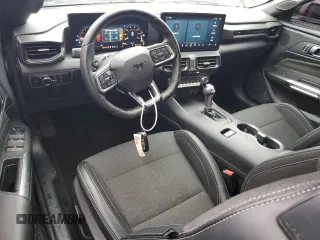 2024 Ford Mustang EcoBoost z VIN 1FAGP8UHXR5118099, wystawiony jako Copart lot #56729295 z przebiegiem 21 347 mil mil oraz Szkoda całkowita • Salvage title. Historia ofert i sprzedaży dostępna na DreamBid. Obrazek 8.