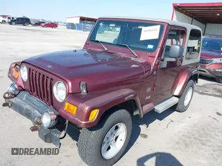 2004 Jeep Wrangler Sahara with VIN 1J4FA59S24P739581, listed as a IAAI auction lot 41696146 with 232,139 mi miles and . Bid and sale history available at DreamBid. Image 17.