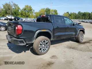 2024 GMC Canyon 4WD AT4 with VIN 1GTP6DEK2R1180037, listed as a Copart auction lot 71637264 with 7,565 mi miles and Salvage Title. Bid and sale history available at carsss.com. Image 3.
