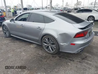 2016 Audi A7 3.0 Premium Plus with VIN WAUWGAFC0GN003357, listed as a IAAI auction lot 41468854 with 62,590 mi miles. Bid and sale history available at carsss.com. Image 3.