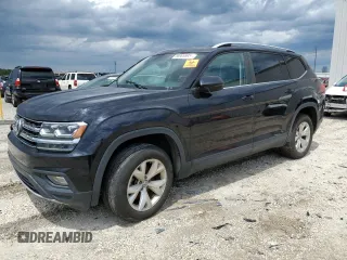 2018 Volkswagen Atlas SE z VIN 1V2CR2CA5JC582694, wystawiony jako Copart lot #56905595 z przebiegiem 111 842 mil mil oraz Czysty tytuł • Clean title. Historia ofert i sprzedaży dostępna na DreamBid. Obrazek 1.