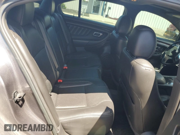 2013 Ford Taurus Limited with VIN 1FAHP2F85DG225363, listed as a Copart auction lot 56127255 with 128,660 mi miles and Salvage title. Bid and sale history available at DreamBid. Image 10.