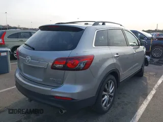 2015 Mazda CX-9 Grand Touring with VIN JM3TB3DA6F0447184, listed as a IAAI auction lot 41771865 with 137,814 mi miles. Bid and sale history available at carsss.com. Image 4.