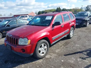 2006 Jeep Grand Cherokee Laredo with VIN 1J4GR48KX6C128491, listed as a IAAI auction lot 41949301 with 183,791 mi miles. Bid and sale history available at carsss.com. Image 2.
