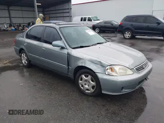 1999 Honda Civic EX z VIN 1HGEJ8643XL010821, wystawiony jako IAAI lot #41602036 z przebiegiem 165 139 mil mil oraz . Historia ofert i sprzedaży dostępna na DreamBid. Obrazek 1.