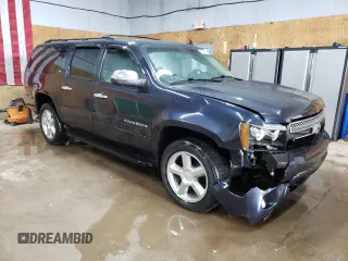 2013 Chevrolet Suburban LT with VIN 1GNSKJE75DR191647, listed as a Copart auction lot 54132905 with 127,916 mi miles and Clean title. Bid and sale history available at DreamBid. Image 4.