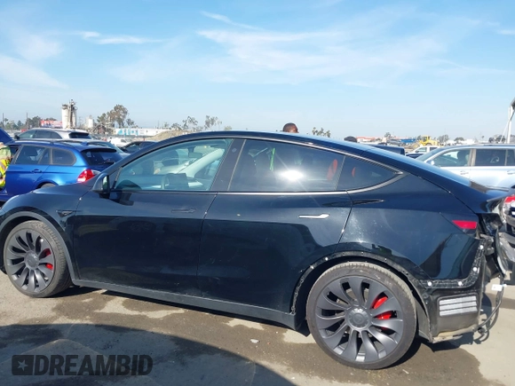 2021 Tesla Model Y Performance with VIN 5YJYGDEF1MF092889, listed as a IAAI auction lot 42076715 with 48,373 mi miles and . Bid and sale history available at DreamBid. Image 14.