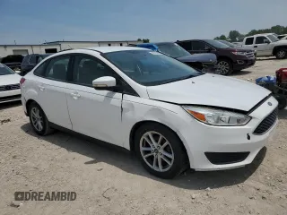 2016 Ford Focus SE with VIN 1FADP3F25GL404899, listed as a Copart auction lot 60785635 with Not provided miles and Clean title. Bid and sale history available at DreamBid. Image 4.