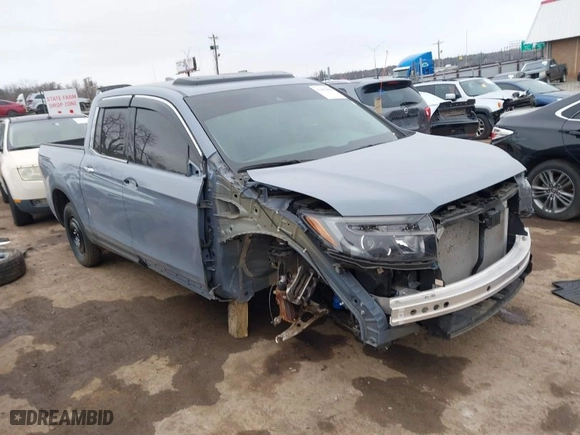 2023 Honda Ridgeline RTL-E with VIN 5FPYK3F70PB030718, listed as a IAAI auction lot 41667869 with 18,768 mi miles. Bid and sale history available at carsss.com. Image 1.