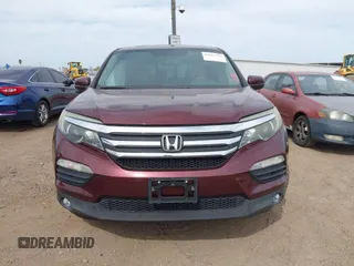 2016 Honda Pilot EX-L with VIN 5FNYF5H57GB028307, listed as a IAAI auction lot 41925711 with 125,118 mi miles and . Bid and sale history available at DreamBid. Image 12.