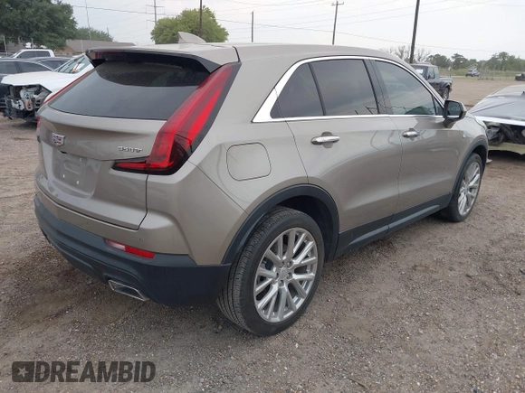 2023 Cadillac XT4 FWD Luxury z VIN 1GYAZAR43PF152992, wystawiony jako IAAI lot #42160015 z przebiegiem 29 466 mil mil oraz . Historia ofert i sprzedaży dostępna na DreamBid. Obrazek 4.