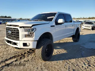 2015 Ford F-150 XLT with VIN 1FTEW1EP9FFC91698, listed as a Copart auction lot 87816535 with 127,459 mi miles and Salvage Title. Bid and sale history available at carsss.com. Image 1.
