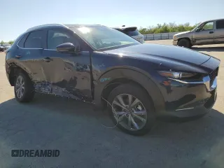 2025 Mazda CX-30 S Preferred with VIN 3MVDMBCM3SM762186, listed as a Copart auction lot 47037245 with 1,969 mi miles and Salvage Title. Bid and sale history available at DreamBid. Image 4.