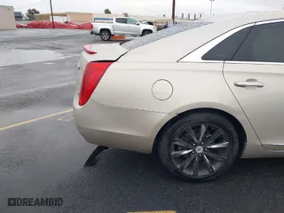 2013 Cadillac XTS with VIN 2G61N5S32D9127146, listed as a IAAI auction lot 41578528 with 98,529 mi miles. Bid and sale history available at carsss.com. Image 4.