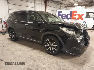 2019 Honda Pilot Touring 7-Passenger with VIN 5FNYF6H65KB018642, listed as a IAAI auction lot 42630603 with 65,489 mi miles and . Bid and sale history available at DreamBid. Image 1.