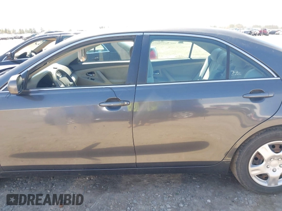 2009 Toyota Camry with VIN 4T1BE46K39U821542, listed as a IAAI auction lot 41876956 with 218,910 mi miles. Bid and sale history available at carsss.com. Image 15.