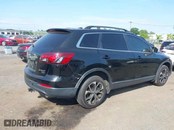 2013 Mazda CX-9 Touring with VIN JM3TB3CV2D0411543, listed as a IAAI auction lot 42777611 with 193,224 mi miles and . Bid and sale history available at DreamBid. Image 4.