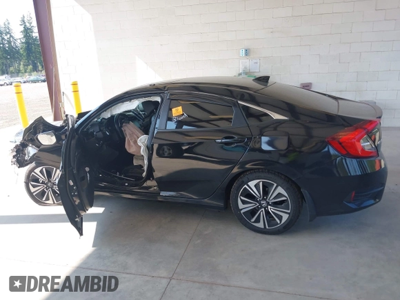 2016 Honda Civic EX-L z VIN 2HGFC1F76GH650308, wystawiony jako IAAI lot #42408661 z przebiegiem Nie podano mil oraz . Historia ofert i sprzedaży dostępna na DreamBid. Obrazek 14.