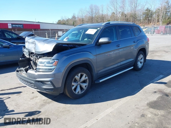 2018 Volkswagen Atlas SE with VIN 1V2CR2CA0JC571988, listed as a IAAI auction lot 41848862 with 96,426 mi miles and . Bid and sale history available at DreamBid. Image 18.