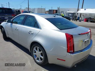 2008 Cadillac CTS RWD with VIN 1G6DM577280111413, listed as a IAAI auction lot 42238643 with 114,706 mi miles and . Bid and sale history available at DreamBid. Image 3.