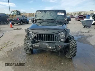 2017 Jeep Wrangler Willys Wheeler with VIN 1C4AJWAG1HL624254, listed as a Copart auction lot 42678975 with 51,936 mi miles and Salvage Title. Bid and sale history available at DreamBid. Image 14.