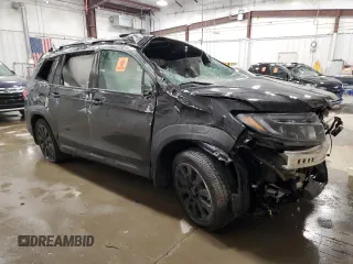2022 Honda Passport Elite z VIN 5FNYF8H07NB008223, wystawiony jako Copart lot #56065465 z przebiegiem Nie podano mil oraz Nie do naprawy. Historia ofert i sprzedaży dostępna na DreamBid. Obrazek 4.