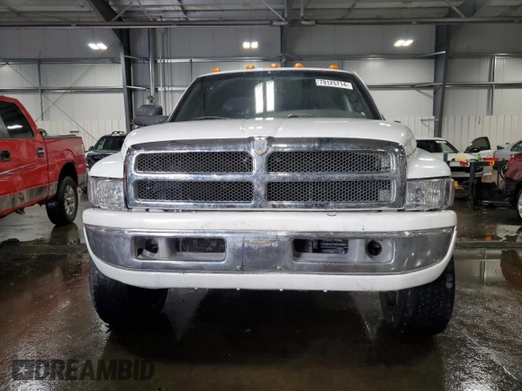 1999 Dodge Ram 2500 with VIN 1B7KF23W3XJ633020, listed as a Copart auction lot 79125714 with 223,927 mi miles and Salvage Title. Bid and sale history available at carsss.com. Image 5.