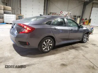 2018 Honda Civic EX with VIN 19XFC2F75JE005057, listed as a Copart auction lot 48601125 with 84,100 mi miles and Salvage Title. Bid and sale history available at DreamBid. Image 3.