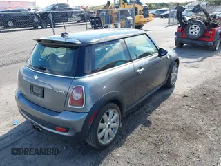 2007 MINI Hardtop S with VIN WMWMF73587TT84728, listed as a IAAI auction lot 41996879 with 145,094 mi miles and . Bid and sale history available at DreamBid. Image 4.