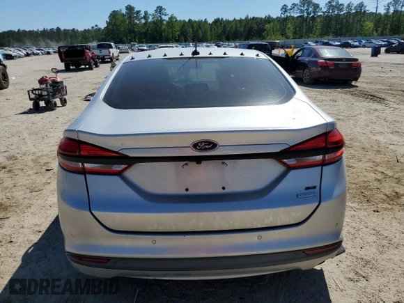 2017 Ford Fusion SE z VIN 3FA6P0HD7HR184691, wystawiony jako Copart lot #52515085 z przebiegiem 113 275 mil mil oraz Szkoda całkowita • Salvage title. Historia ofert i sprzedaży dostępna na DreamBid. Obrazek 6.
