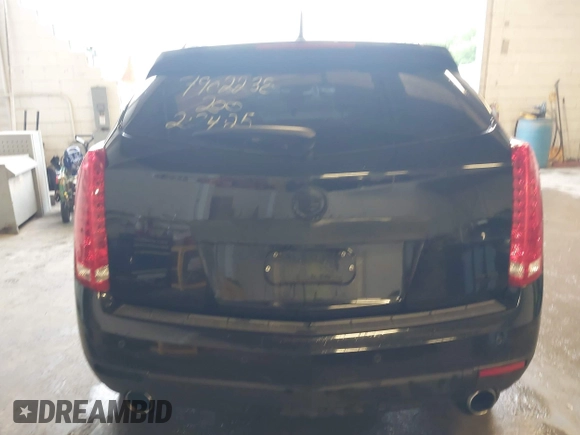 2014 Cadillac SRX Performance Collection with VIN 3GYFNFE39ES659013, listed as a IAAI auction lot 42264069 with 129,122 mi miles and . Bid and sale history available at DreamBid. Image 16.