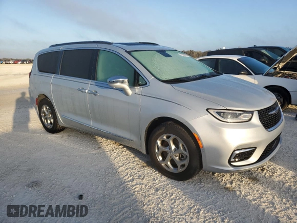 2022 Chrysler Pacifica Limited with VIN 2C4RC3GG4NR175206, listed as a Copart auction lot 77249974 with Not provided miles and Salvage title. Bid and sale history available at DreamBid. Image 4.
