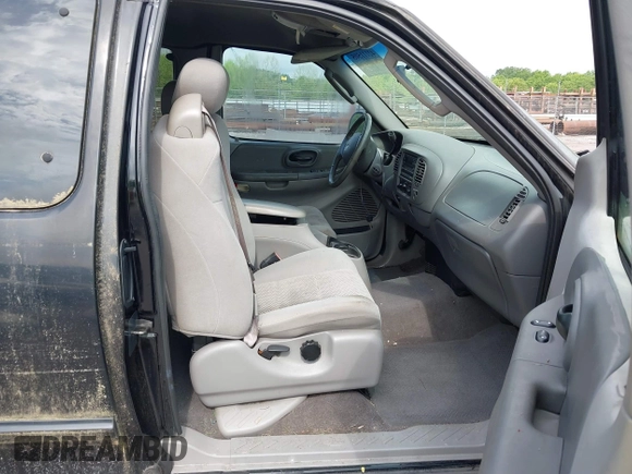2003 Ford F-150 XL with VIN 1FTRX17263NA23449, listed as a IAAI auction lot 42111505 with 1 mi miles. Bid and sale history available at carsss.com. Image 5.